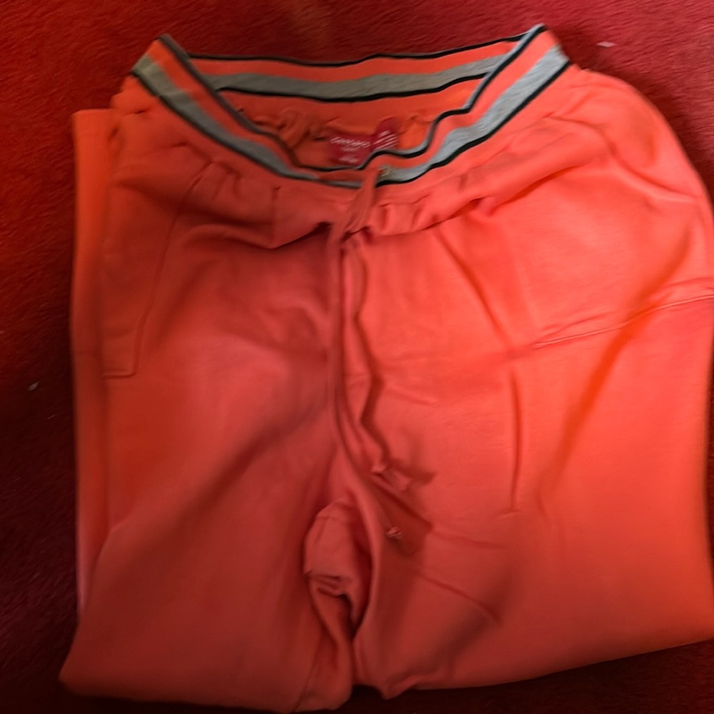 Sweat pants. Wide leg.NWOT 3X  orange color.2 front pockets. No back pockets.